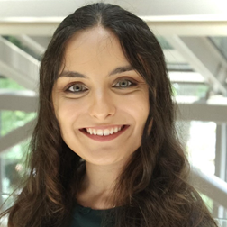A photograph of East Cobb Tutoring Center tutor, Mia. Mia is looking at the camera and smiling. Mia tutors elementary and middle school students as well as high school language arts, social studies and history.